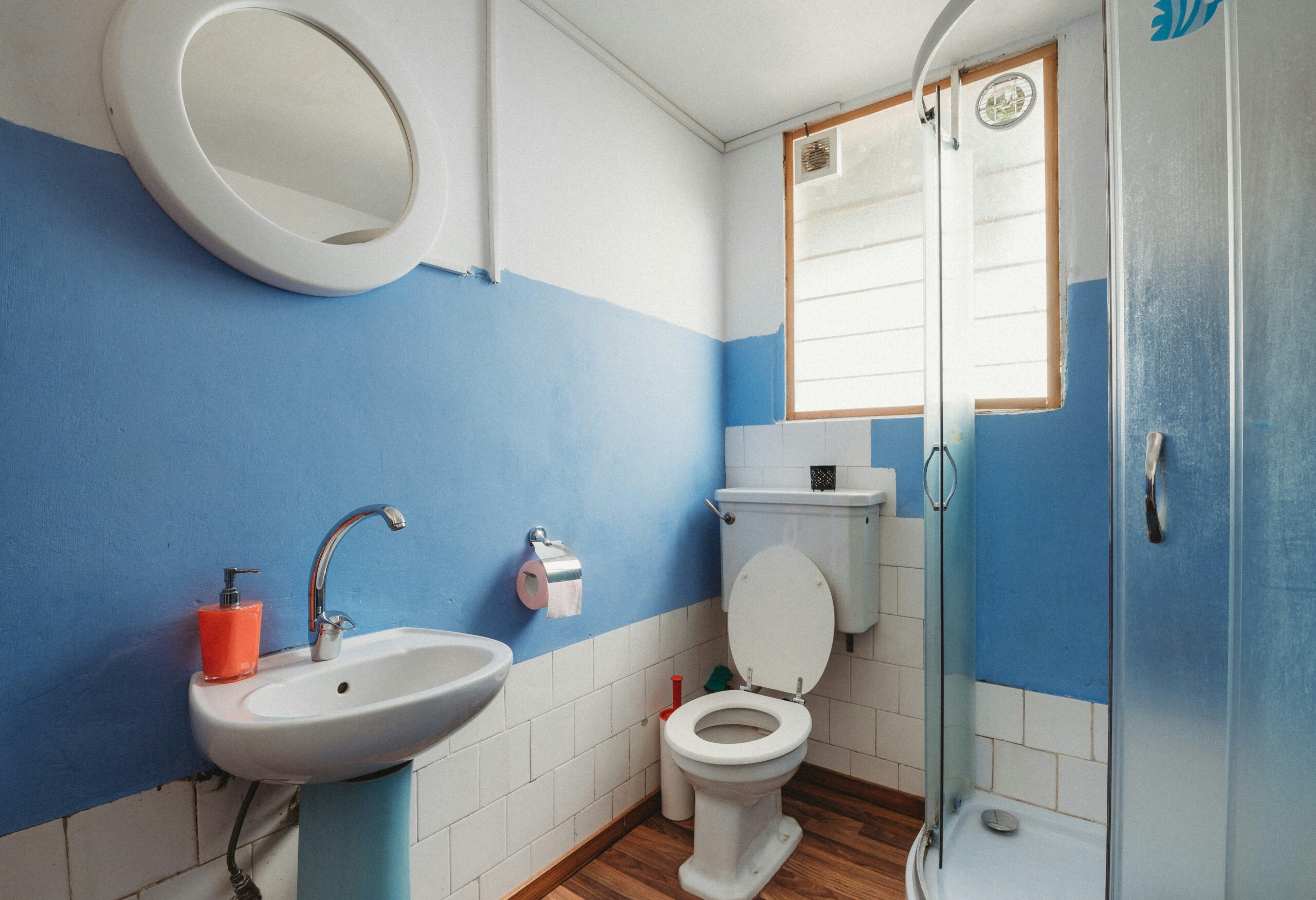 How to Unclog a Toilet Without a Plunger featuring DIY unclogging methods, hot water, dish soap, plumbing tips, and toilet maintenance.