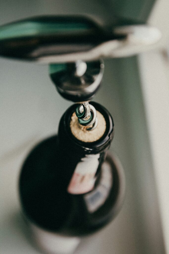 How to Get a Cork Out of a Wine Bottle guide to stubborn cork removal, tool use, broken corks, bottle stability, and careful opening.