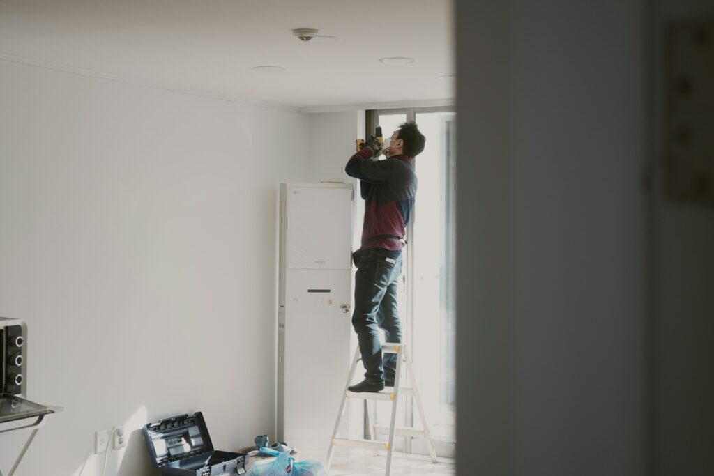 How to Fix Drafty Windows guide to caulking, draft prevention, insulation, weather seals, window film, and professional repair signs.